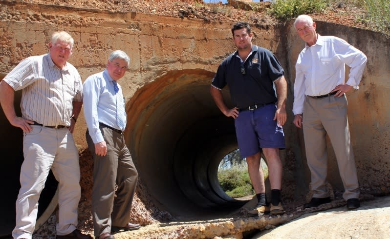 George Anderson, Graeme Fardon, Troy Newick and Darryl Richards at an ageing culvert on the Quairading-Cunderdin Road. Picture: Jo Fullwood/Countryman