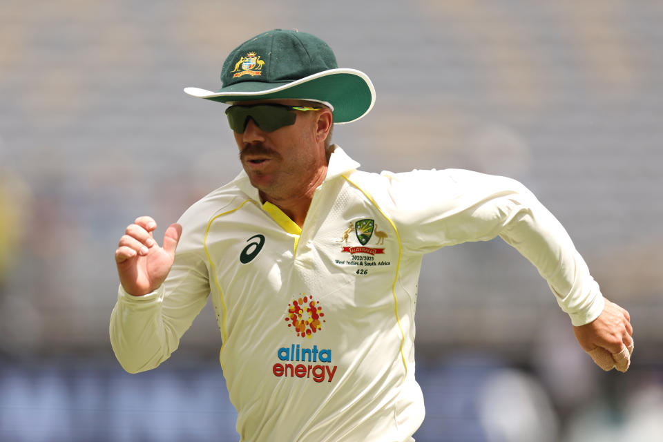 Seen here, Aussie cricketer David Warner chases a ball during day five of the first Test match against the West Indies in Perth. 