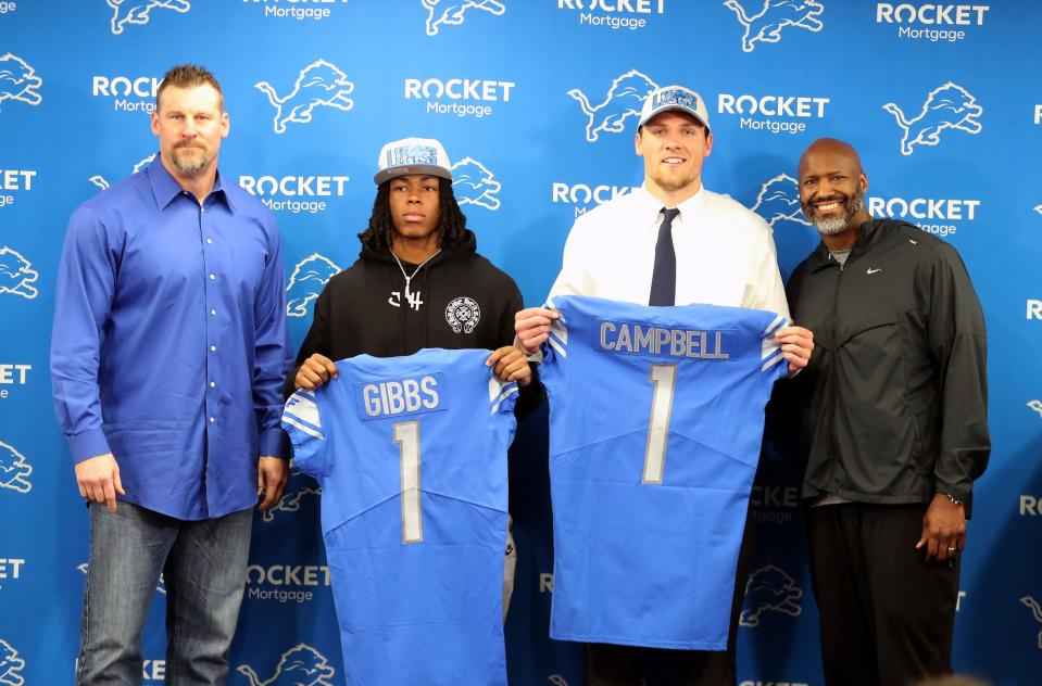 Detroit Lions coach Dan Campbell, Jahmyr Gibbs from Alabama, Jack Campbell from Iowa, and general manager Brad Holmes pose during the players'  introductory news conference at team headquarters in Allen Park on Friday, April 28, 2023.