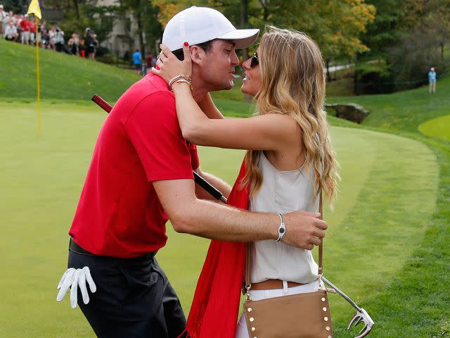 <p>Gregory Shamus/Getty</p> Keegan Bradley and Jillian Stacey during the Day Three Four-ball Matches at the Muirfield Village Golf Club on October 5, 2013 in Dublin, Ohio.