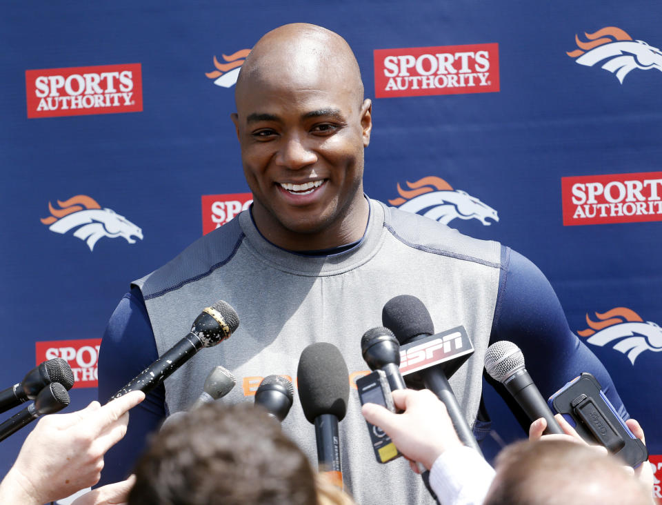 Denver Broncos defensive end DeMarcus Ware talks to the media after working out at the NFL football teams training facility in Englewood, Colo., on Monday, April 21, 2014. (AP Photo/Ed Andrieski)