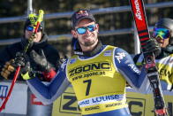 Italy's Dominik Paris celebrates his second place finish following the men's World Cup downhill ski race at Lake Louise, Alberta, Canada, Saturday, Nov. 30, 2019. (Jeff McIntosh/The Canadian Press via AP)