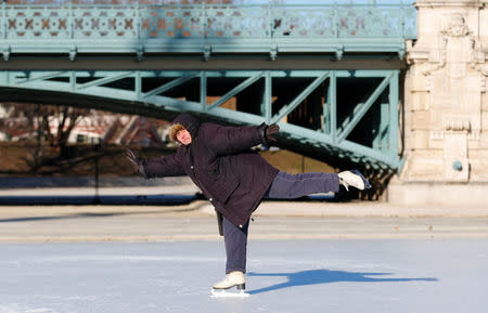 An elderly woman skates in sub-zero temperatures at the City Park Ice Rink in Budapest, Hungary, January 6, 2017. REUTERS/Laszlo Balogh