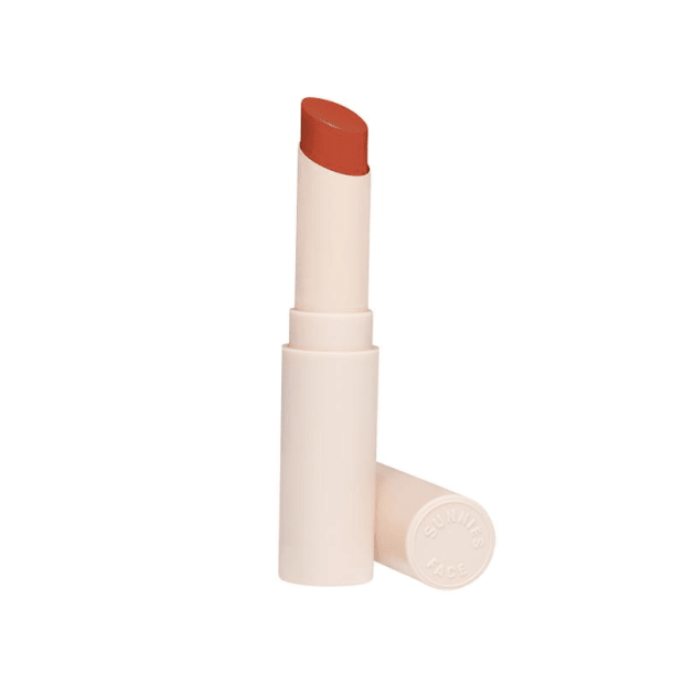 <p><strong>Sunnies Face Lip Treat in Poppy, $16, <a href="https://sunniesface.com/products/lip-treat-tinted-lip-balm?variant=42885414060251" rel="nofollow noopener" target="_blank" data-ylk="slk:available here" class="link ">available here</a>: </strong>"This sheer tinted balm is ultra-moisturizing, thanks to shea butter and medowfoam seed oil, and deposits the perfect wash of poppy red pigment, which can be layered for more intensity. It's been a late summer go-to for me." —Stephanie Saltzman, Beauty Director</p>