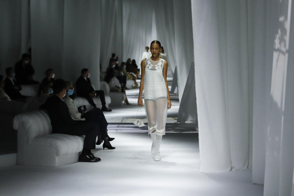 A model wears a creation as part of the Fendi 2021 women's spring-summer ready-to-wear collection during the Milan's fashion week in Milan, Italy, Wednesday, Sept. 23, 2020. (AP Photo/Antonio Calanni)