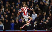 Peter Crouch of Stoke City celebrates scoring against Chelsea during their English Premier League soccer match at the Britannia Stadium in Stoke-on-Trent, central England, December 7, 2013. REUTERS/Andrew Winning