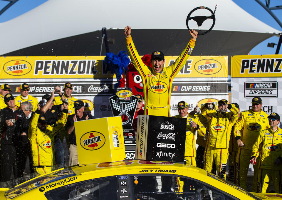 Joey Logano celebrates after winning a NASCAR Cup Series auto race at the Las Vegas Motor Speedway on Sunday, Feb. 23, 2020. (AP Photo/Chase Stevens)