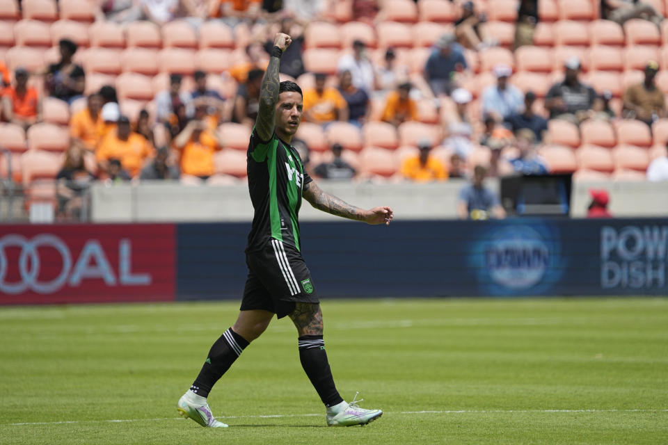 Austin FC's Sebastián Driussi celebrates after scoring a goal against the Houston Dynamo during the second half of a MLS soccer match Saturday, April 30, 2022, in Houston. Austin FC won 2-1. (AP Photo/David J. Phillip)