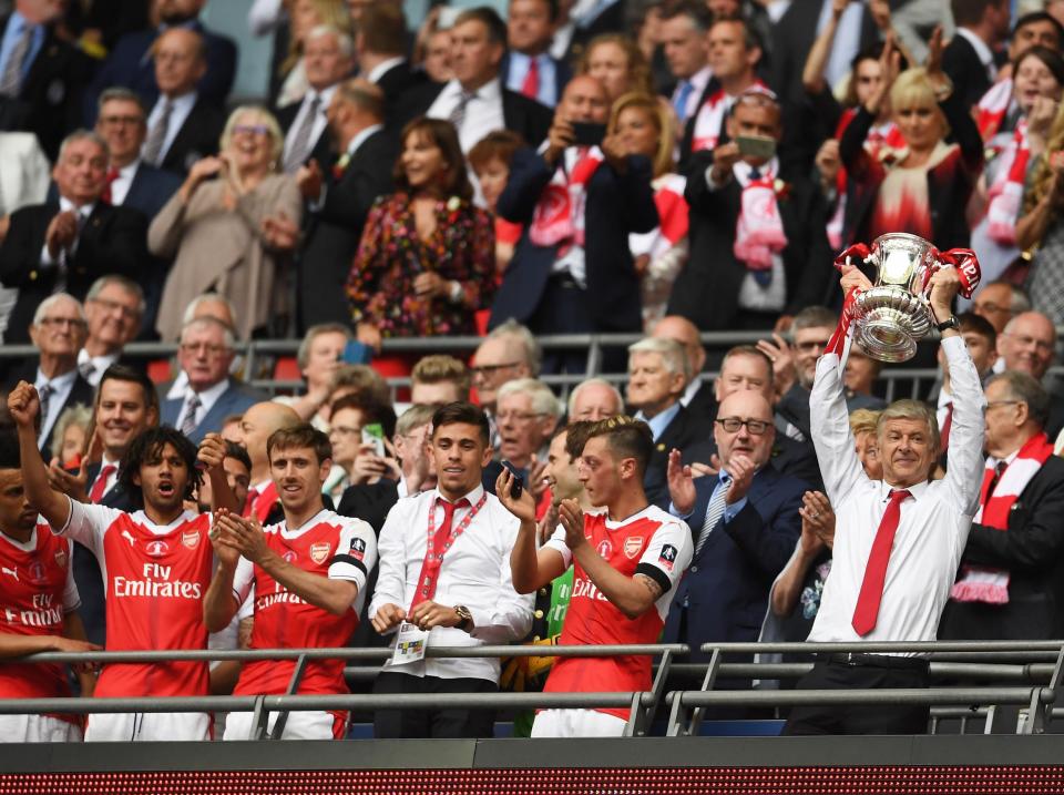 Wenger lifts the FA Cup at Wembley Stadium: Getty