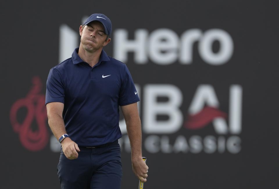 Rory McIlroy of Northern Ireland reacts after missing a ball on the 18th hole during the competition of the second round of the Dubai Desert Classic, in Dubai, United Arab Emirates, Saturday, Jan. 28, 2023. (AP Photo/Kamran Jebreili)