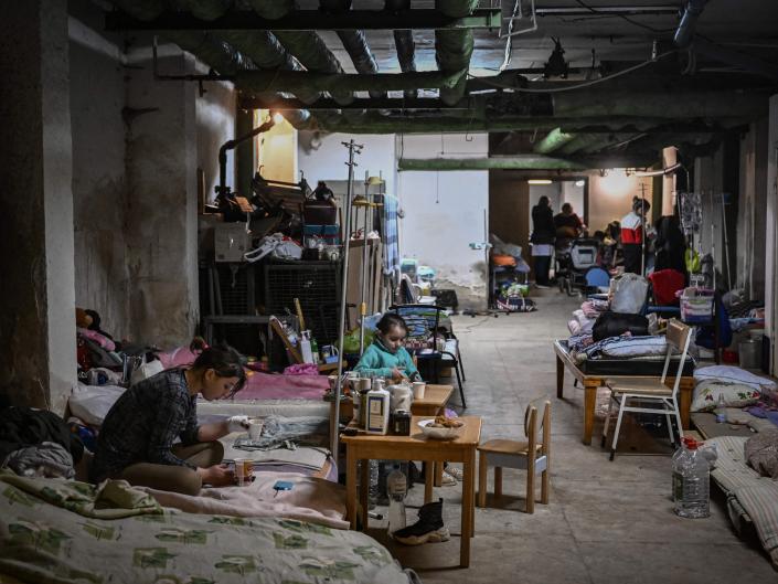 Children being treated at a pediatrics hospital have their beds placed in the basement of the hospital which is being used as a bomb shelter, in Kyiv on February 28, 2022.