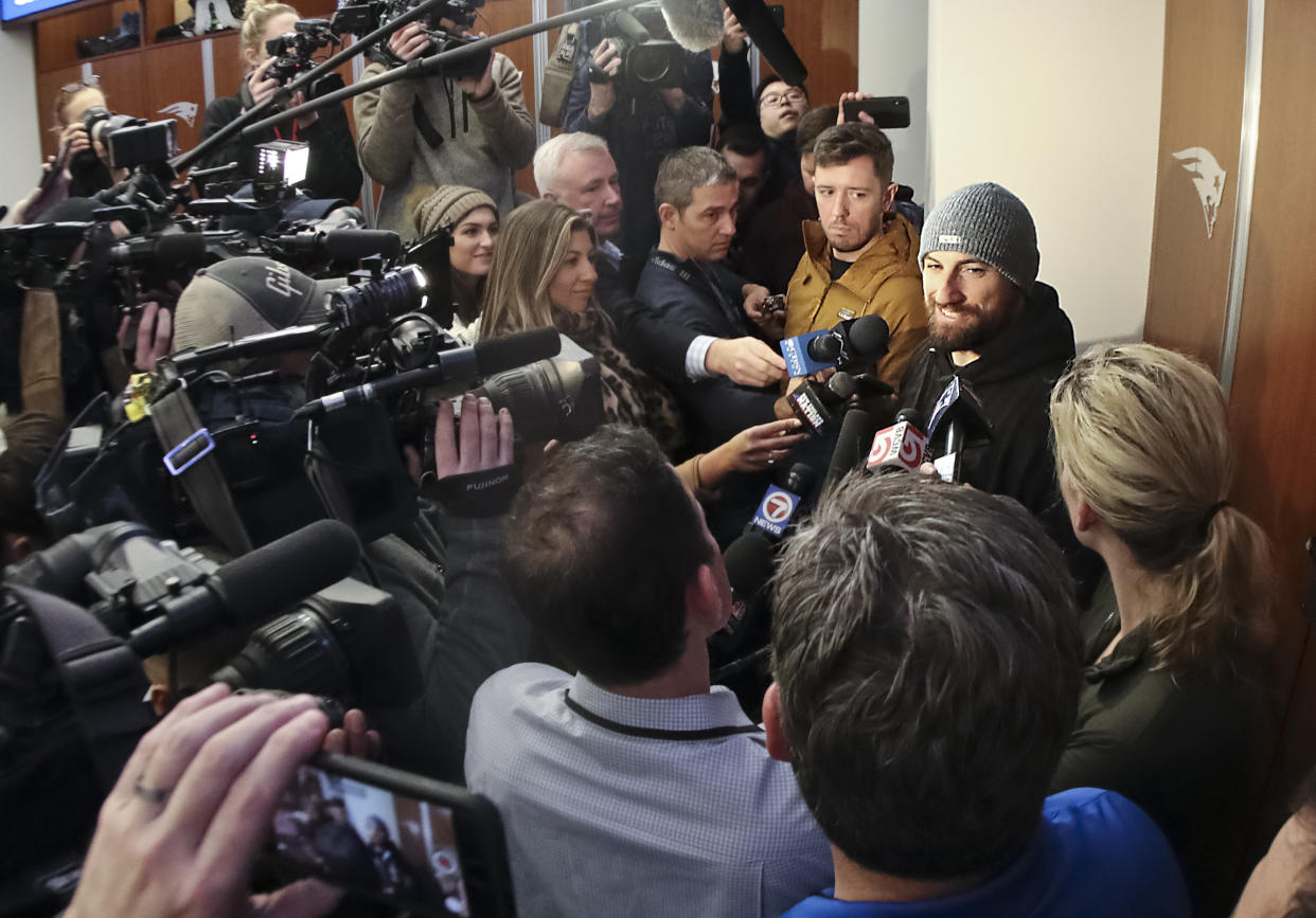 Scenes like this 2020 playoffs media scrum in the New England Patriots locker room wont exist in 2021. (Matthew J. Lee/The Boston Globe via Getty Images)