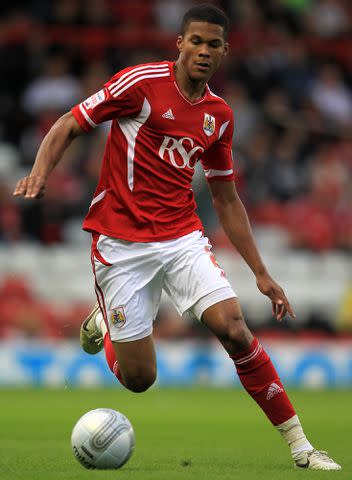 <p>Mike Egerton - PA Images/Getty </p> Naomi Scott's husband Jordan Spence playing soccer