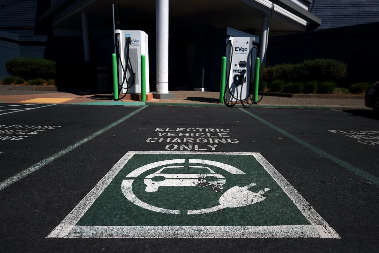 EV chargers in Corte Madera, Calif. <a href="https://www.gettyimages.com/detail/news-photo/view-of-electric-car-chargers-on-september-23-2020-in-corte-news-photo/1276021168" rel="nofollow noopener" target="_blank" data-ylk="slk:Justin Sullivan/Getty Images;elm:context_link;itc:0;sec:content-canvas" class="link ">Justin Sullivan/Getty Images</a>