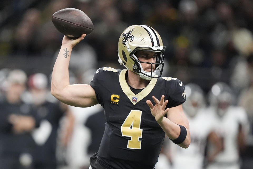 New Orleans Saints quarterback Derek Carr (4) sets back to pass in the first half of an NFL football game against the Atlanta Falcons in New Orleans, Sunday, Jan. 7, 2024. (AP Photo/Gerald Herbert)