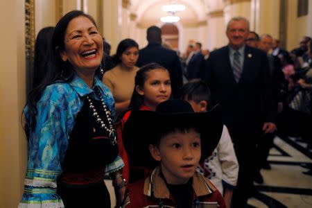 U.S. Representative Deb Haaland (D-NM) laughs after becoming one of the first two Native American women in the U.S. House of Representatives at the U.S. Capitol in Washington, U.S., January 3, 2019. REUTERS/Brian Snyder