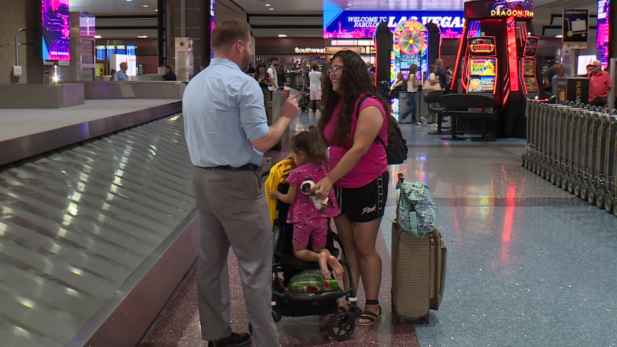 Briana Perez, right, and her daughter, Selenas, middle, speak to 8 News Now reporter Ryan Matthey about their first experience on a Southwest flight. (KLAS)