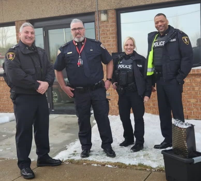 Insp. Ed Armstrong of Windsor police (far right) with Chief of Windsor police Jason Bellaire (left), Insp. Marc LeSage of Anishinabek police, and Sgt. Kristina Stannard of Windsor police.