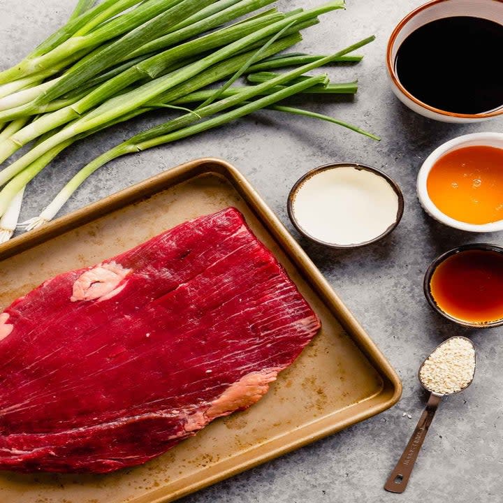 Ingredients for beef and scallion rolls.