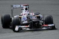 Sauber's Japanese driver Kamui Kobayashi drives during the qualifing session at the Spa-Francorchamps circuit in Spa. Jenson Button took his first pole position for McLaren when he clocked the fastest time during qualifying for Sunday's Belgian Grand Prix