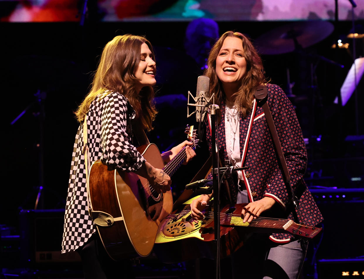 NEW YORK, NEW YORK - MARCH 07: (L-R) Rebecca Lovell and Megan Lovell of Larkin Poe perform onstage during the Eighth Annual LOVE ROCKS NYC Benefit Concert For God's Love We Deliver at Beacon Theatre on March 07, 2024 in New York City. (Photo by Jamie McCarthy/Getty Images for LOVE ROCKS NYC/God's Love We Deliver )