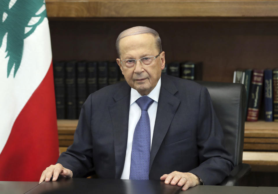 In this photo released by the Lebanese government, Lebanese president Michel Aoun addressees a speech, in the presidential palace, in Baabda, east of Beirut, Lebanon, Thursday, Oct. 24, 2019. Aoun told tens of thousands of protesters that an economic reform package put forth by the country's prime minister will be the "first step" toward saving Lebanon from economic collapse. During his address to the nation on Thursday, Aoun pledged to exert every effort to implement radical reform but also said change can only come from within state institutions. (Dalati Nohra/Lebanese government via AP)