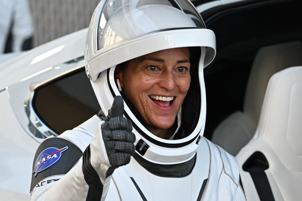 NASA astronaut Nicole Mann waves as she leaves ahead of the launch of the SpaceX Falcon 9 rocket at the Kennedy Space Center in Florida on October 5, 2022. (Photo by Jim WATSON / AFP) (Photo by JIM WATSON/AFP via Getty Images)