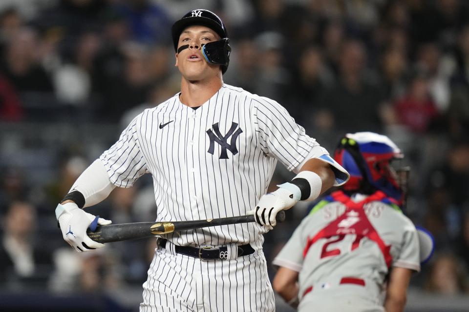 New York Yankees' Aaron Judge reacts after striking out during the sixth inning of a baseball game against the Philadelphia Phillies Tuesday, April 4, 2023, in New York. The Phillies won 4-1. (AP Photo/Frank Franklin II)