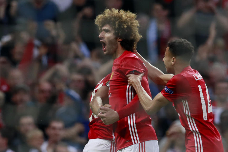 <p>Britain Football Soccer – Manchester United v Celta Vigo – UEFA Europa League Semi Final Second Leg – Old Trafford, Manchester, England – 11/5/17 Manchester United’s Marouane Fellaini celebrates scoring their first goal with Jesse Lingard Action Images via Reuters / Jason Cairnduff Livepic </p>