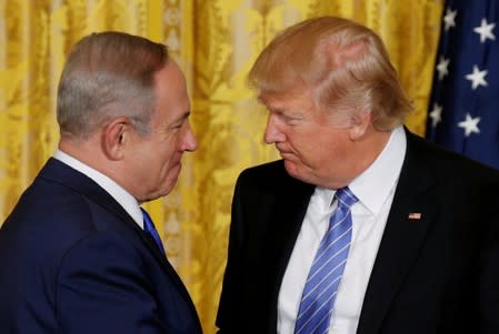 FILE PHOTO: U.S. President Trump greets Israeli PM Netanyahu at a joint news conference at the White House in Washington, DC