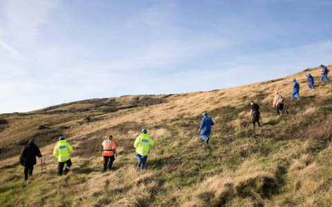 olice and other search and rescue agencies perform a search in the open space above the coast near to Swanage in Dorset as they continue to investigate the disappearance of Gaia Pope - Credit: Matt Cardy/Getty