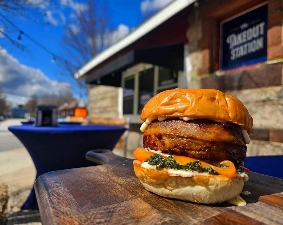 The Takeout Station closed after six months. Pictured is one of the specials: Bacon wrapped meatloaf, pickled red bell peppers, creamed kale with a peppercorn aioli on a brioche bun.