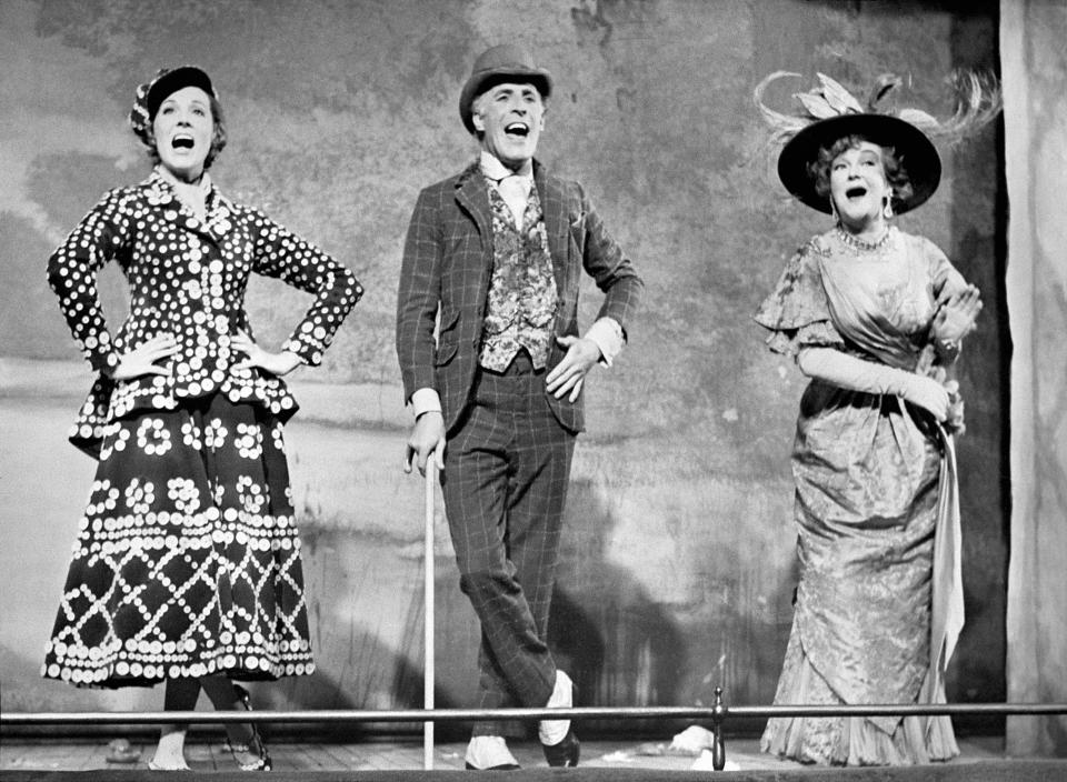 <p>Sir Bruce Forsyth with Beryl and Julie singing ‘Piccadilly,’ on stage at the old Brixton Music Hall in 1967. (PA) </p>