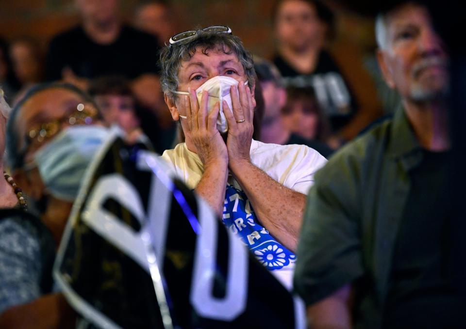 A Beto O'Rourke supporter listens to him speak during an Abilene campaign stop Tuesday.