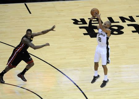 Jun 15, 2014; San Antonio, TX, USA; San Antonio Spurs guard Patyy Mills (8) shoots in the second half against the Miami Heat in game five of the 2014 NBA Finals at AT&T Center. Brendan Maloney-USA TODAY Sports