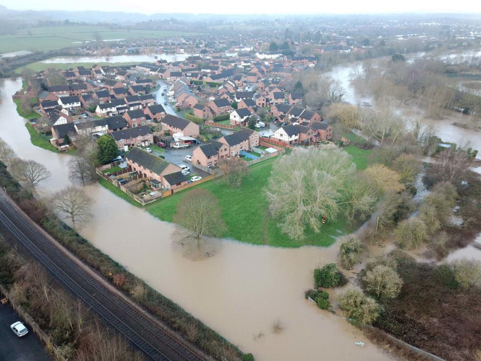 Flooding in Lower Bullingham, Hereford, in the aftermath of Storm Dennis. The Met Office's new supercomputer is intended to help beef up the UK's flood defences: PA
