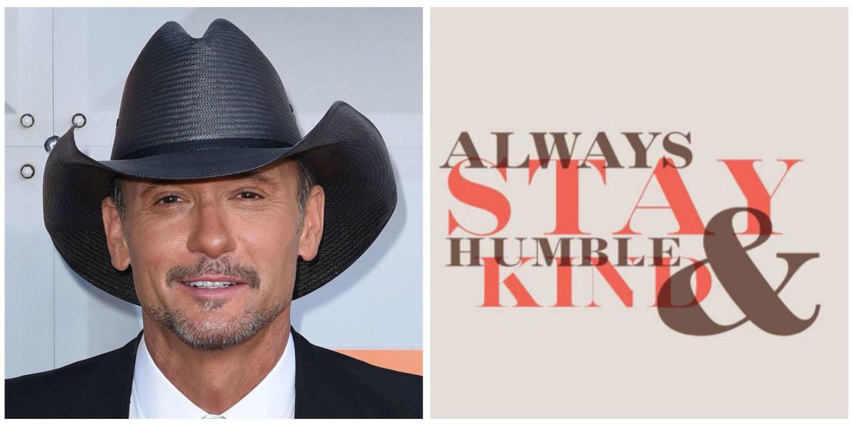 Grammy Award winner Tim McGraw, right, shakes hands with