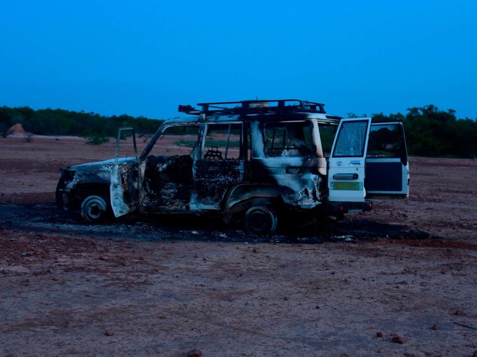 The wreckage of the car where six French aid workers, their local guide and the driver were killed by unidentified gunmen riding motorcycles in an area of southwestern Niger: AFP via Getty Images