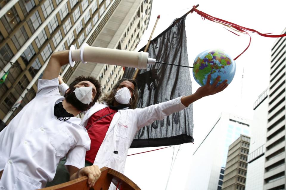 <div class="inline-image__caption"><p>Demonstrators at a protest against President Jair Bolsonaro's administration in Sao Paulo, Brazil, on October 2, 2021.</p></div> <div class="inline-image__credit">Carla Carniel/Reuters</div>