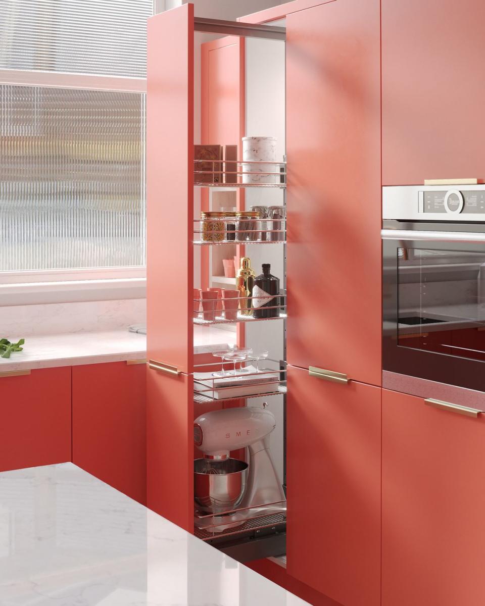 <p>We love this gorgeous pull-out kitchen larder, which is great to consider if you don't have space for a walk-in pantry. Plus, the scene-stealing pop of orange adds a real touch of intrigue. </p><p>• See more from <a href="https://www.wrenkitchens.com/" rel="nofollow noopener" target="_blank" data-ylk="slk:Wren Kitchens;elm:context_link;itc:0;sec:content-canvas" class="link ">Wren Kitchens</a> </p>