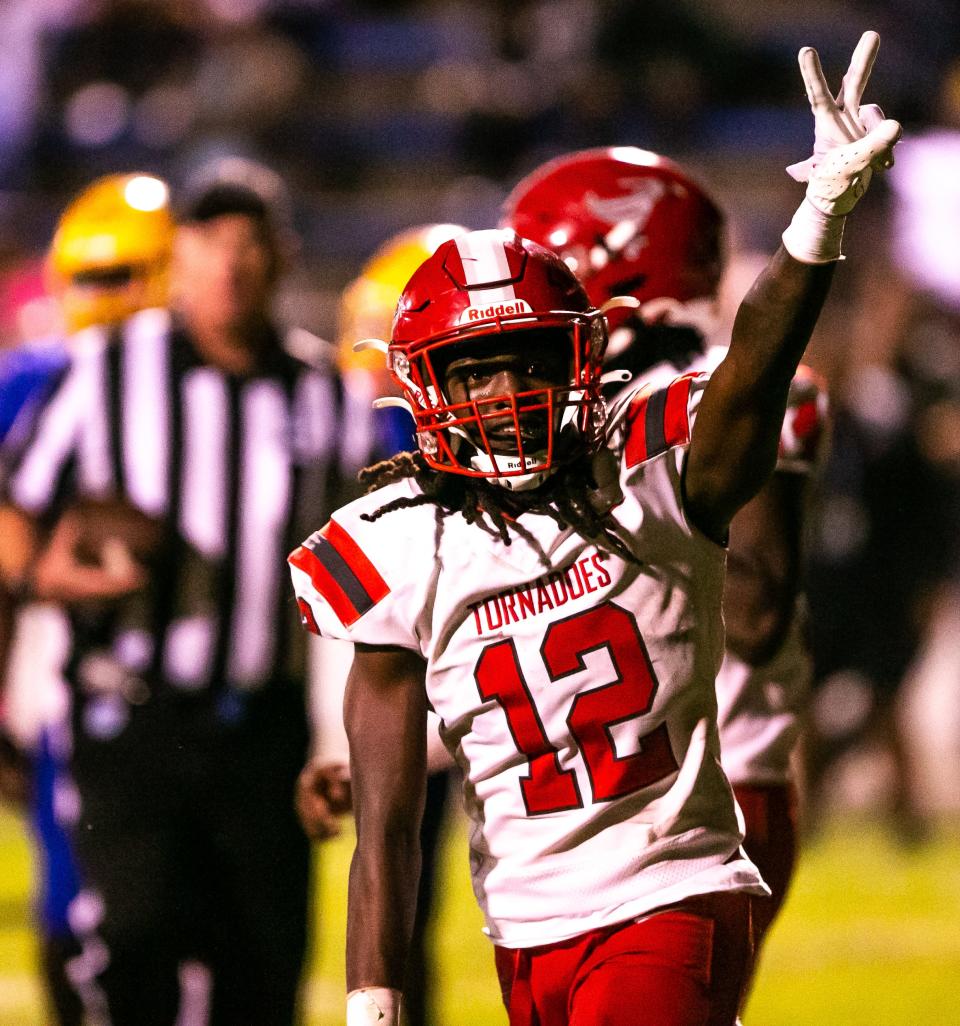 Bradford Tornadoes Willie Pollard (12) signals his touchdown of the night as Palatka High School (7-1) hosted Bradford High School (8-0) at Veterans Memorial Stadium in Palatka , FL on Friday, October 28, 2022. Bradford lead 21-7 at the half. [Doug Engle/Ocala Star Banner]