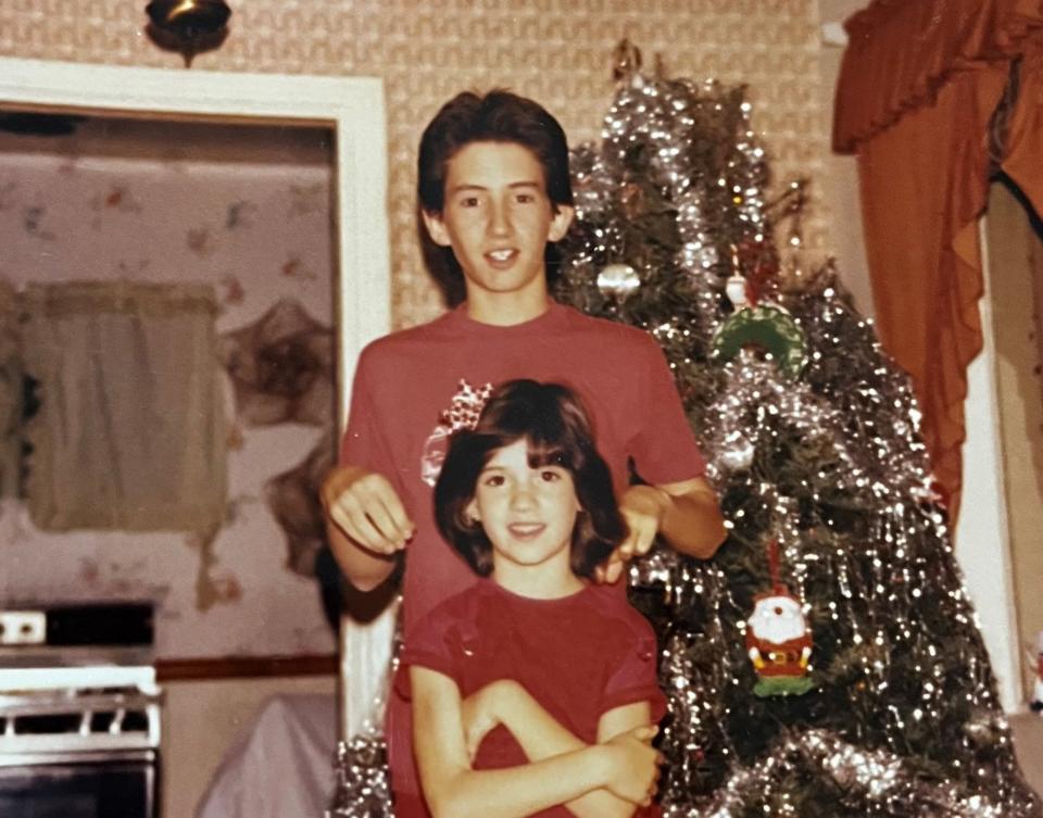 Sean Gorham is seen standing behind his kid sister, Mandi Gorham, in this Christmas Day 1986 photo.