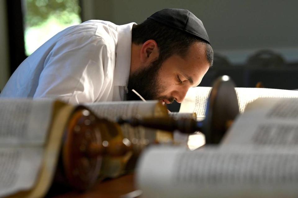 Uriel Waknine, a sofer repairs a Torah scroll at Temple Beth El in Charlotte, NC on Tuesday, April 18, 2023. Tuesday is Holocaust Remembrance Day (Yom HaShoah).