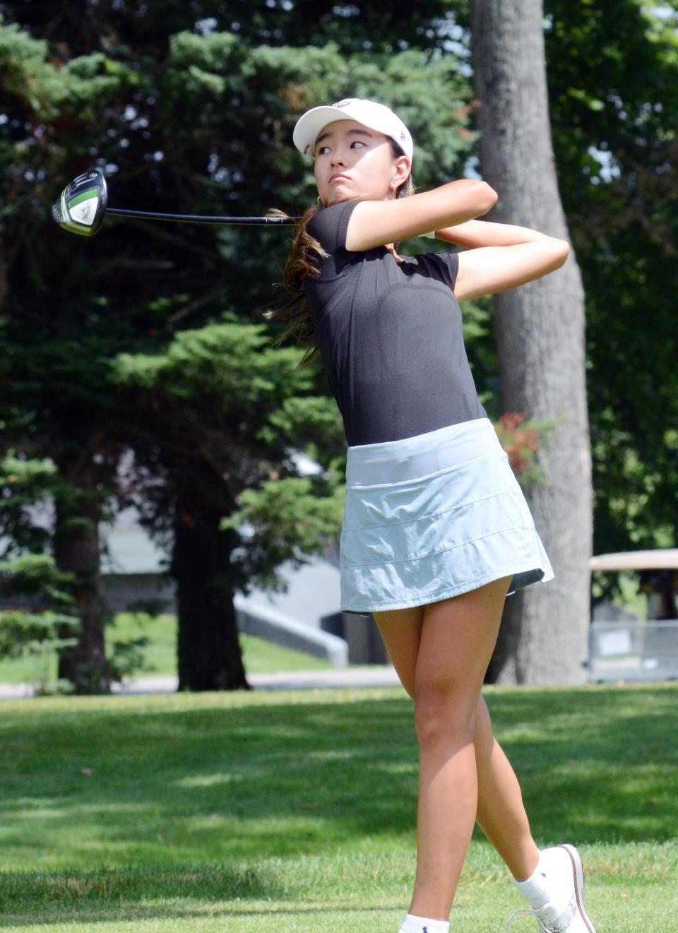 Caroline Chung of Placentia, Calif. watches her opening tee shot Tuesday.