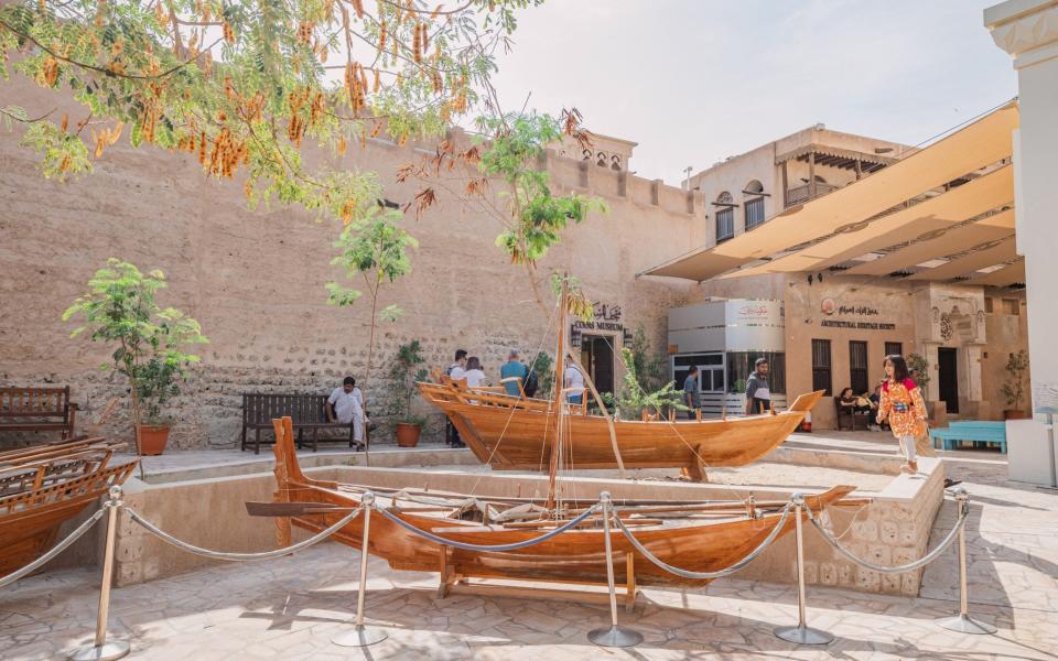 Traditional arab Dhow boats and ships at historical open air museum in Al Fahidi