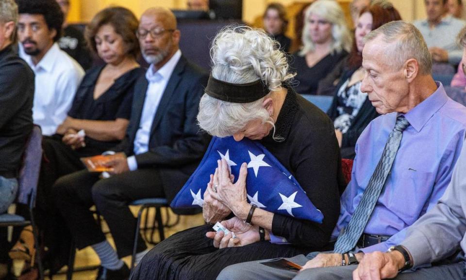 Following a flag folding ceremony, members of the Idaho National Guard presented an American flag to Nick Maimer’s mother, Vivian Maimer Strnad, during his memorial service held at Boise Unitarian Universalist Fellowship on Sept. 20, 2023.