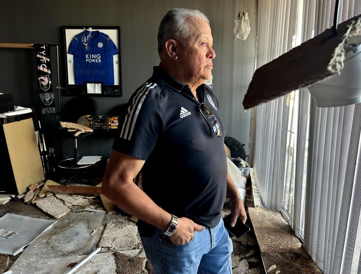 Nicolas Orellana was in his soccer shop business' headquarters when a tornado touched down in Montebello on March 22. The building is still red-tagged. (Brittny Mejia / Los Angeles Times)