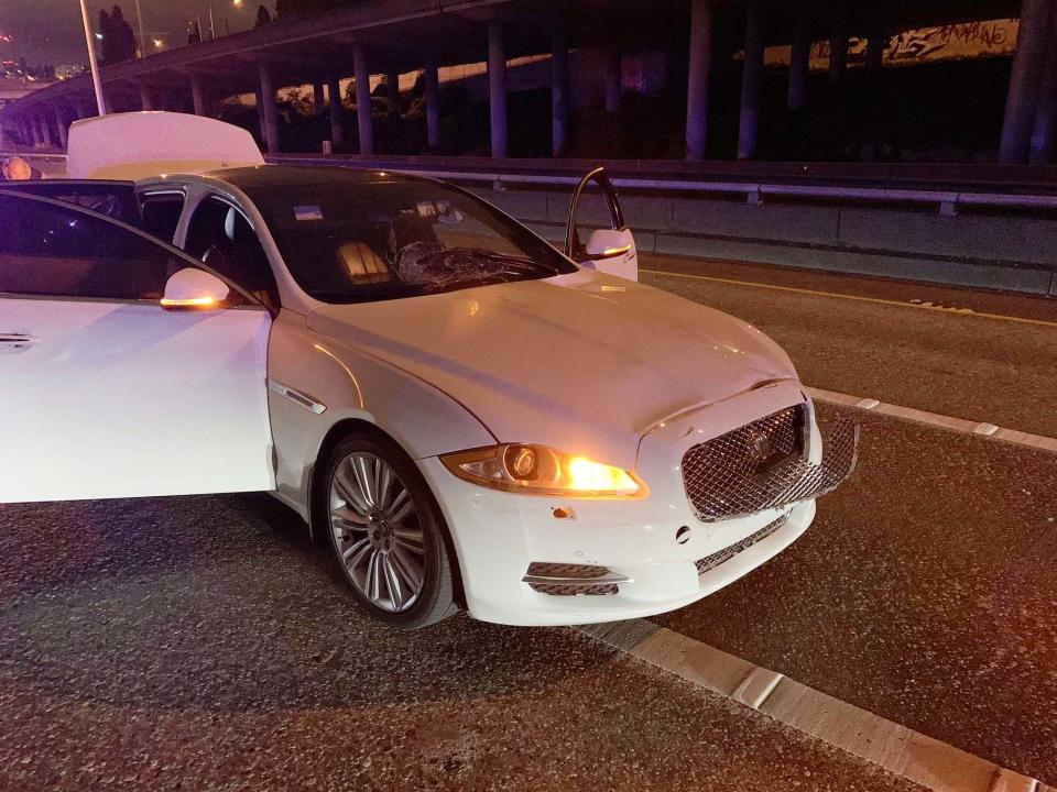 Early on 4 July, a photo shows the car of Dawit Kelete who is suspected of driving into a protest on Interstate 5 in Seattle. The city has been the site of prolonged unrest following the police killing of George Floyd in Minneapolis: Washington State Patrol via AP