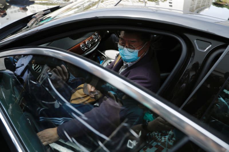 Media mogul and Apple Daily founder Jimmy Lai Chee-ying leaves from a police station after being arrested for illegal assembly during the anti-government protests in Hong Kong