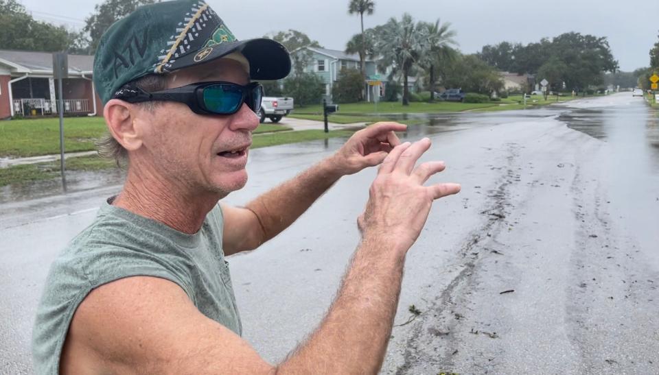 Lee Corbridge describes how flooding near his family's home on Lantern Drive, north of Titusville, is the worst he has ever seen.